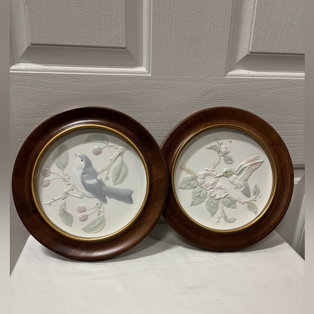 Crowning Touch Set of Two Round Bird Wall Art with Wooden Frames.